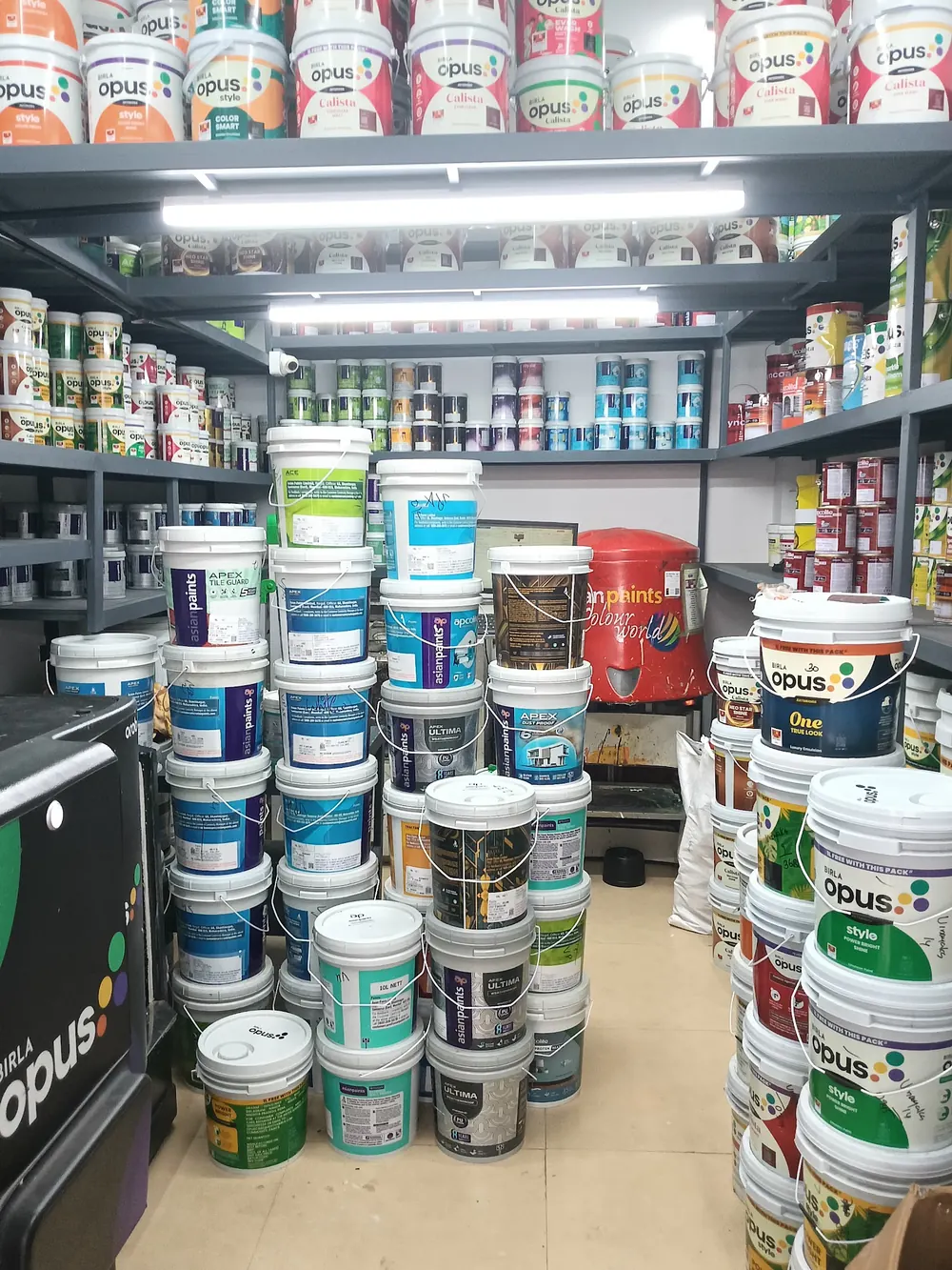 Aisle lined with paint tins