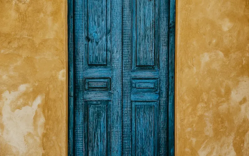 Blue enamel-painted wooden door